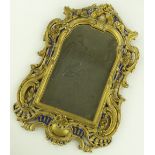 An ornate 19th century gilt gesso framed wall mirr