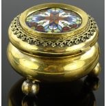 A small Victorian gilt brass trinket box with enam