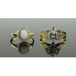 2 9ct gold and diamond set dress rings, total weig