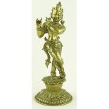 An Antique Oriental bronze dancing deity, height 2