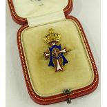 A fine quality gold and enamelled badge by Rowland