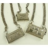 3 Ornate Omani silver Koran necklaces.