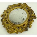 A 19th century Florentine carved and pierced giltw