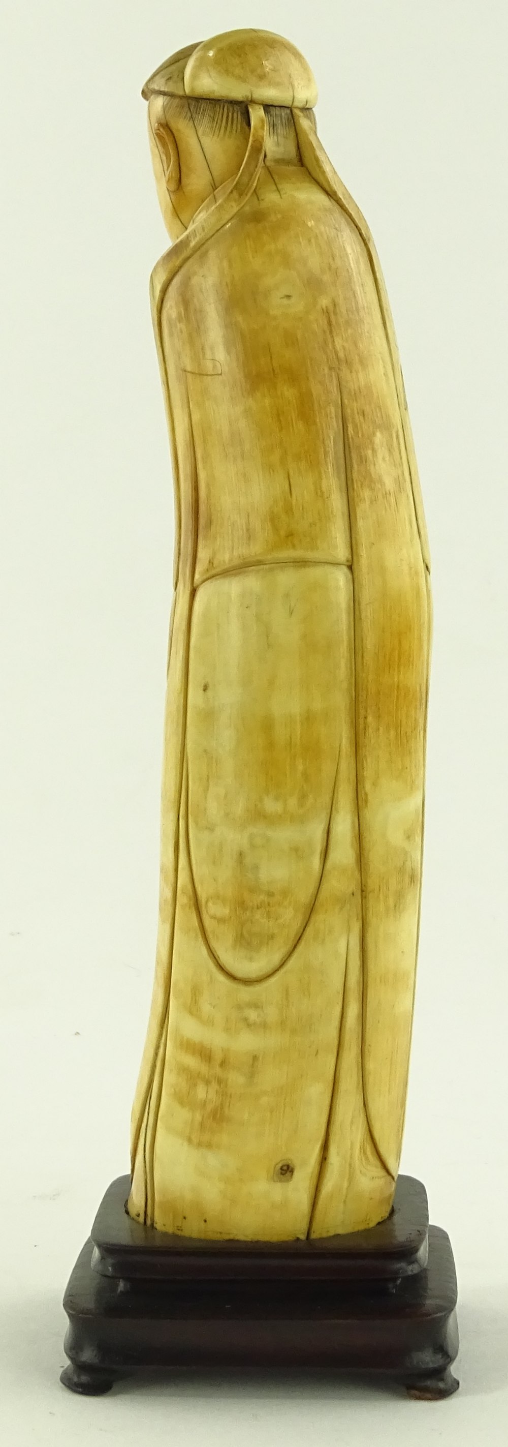 A 17th century carved ivory figure of a monk, with - Image 2 of 3