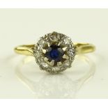 An 18ct sapphire and diamond cluster ring, setting