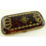 A 19th century tortoiseshell cigar case with gold