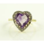 An 18ct gold heart shaped amethyst and diamond clu