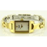 A lady's Universal Geneve quartz wristwatch, stain