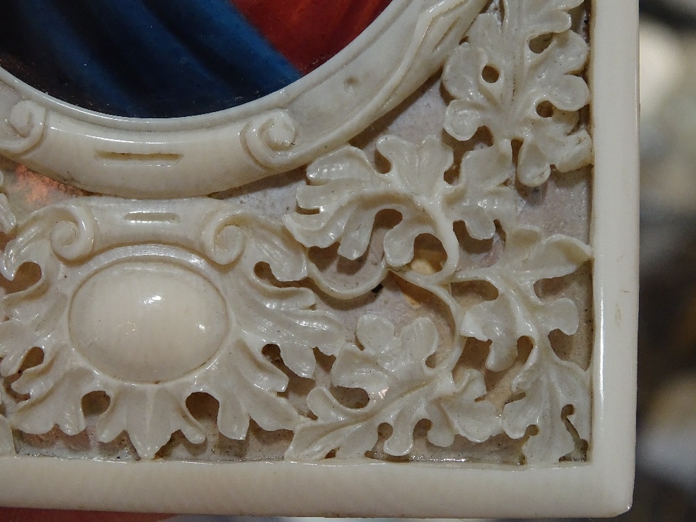 A 19th century relief carved and pierced ivory fra - Image 9 of 10