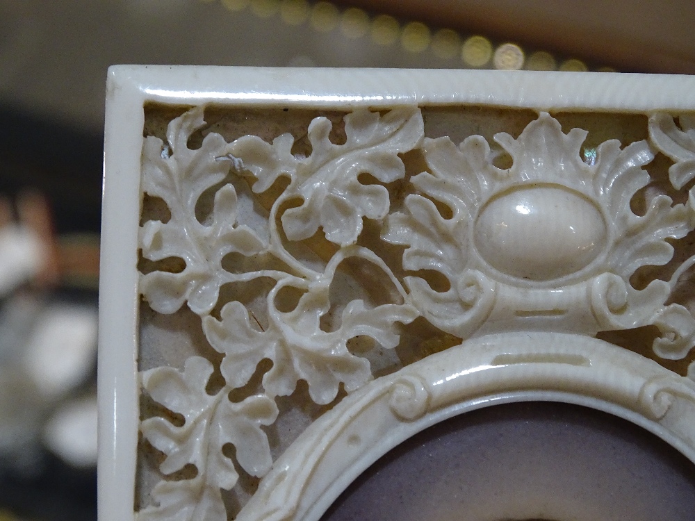 A 19th century relief carved and pierced ivory fra - Image 4 of 10