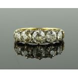 An 18ct gold 5 stone diamond ring, total diamond c