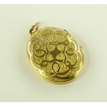 A finely engraved Victorian rolled gold oval locke