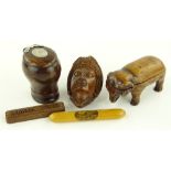 A group of treen items, including an elephant desi