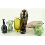 A group of coloured Studio glass vases and bowls.