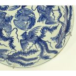 A Chinese blue and white porcelain charger, handpa