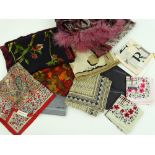 A collection of designer silk scarves, including N