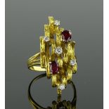 A large 18ct gold ruby and diamond abstract dress