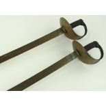 A pair of 19th century Enfield Cavalry swords, one