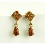 A pair of 5 stone shaded citrine drop earrings, 9c