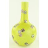 A Chinese yellow glaze porcelain narrow necked vas