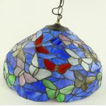 A modern Tiffany style leaded glass butterfly desi