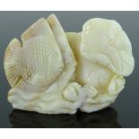 A natural opal specimen carved as tropical fish, l