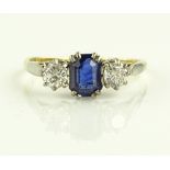 An 18ct gold and platinum 3 stone sapphire and dia