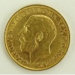 A 1911 gold sovereign.