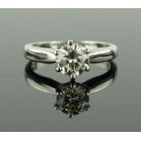 A platinum and solitaire diamond ring, Tiffany sty