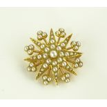 A Victorian pearl starburst brooch/pendant, unmark