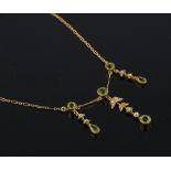 A 15ct gold peridot and pearl drop necklace, large