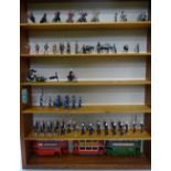 A collection of die-cast miniature metal soldiers