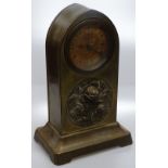 Lancet topped brass cased mantel clock.