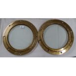 2 Glazed polished brass framed portholes.