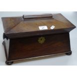 A Victorian walnut sarcophagus tea caddy.