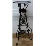 A painted wrought-iron 2-tier stand.