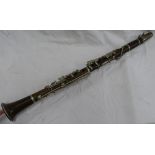 A clarinet with silver plated mounts.