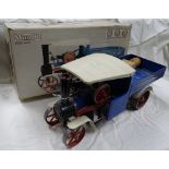 A boxed Mamod steam wagon.