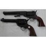 2 Vintage cap guns.