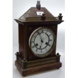 An oak cased 2-train mantel clock.