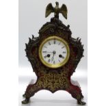 Antique baule work ornate mantel clock with eagle