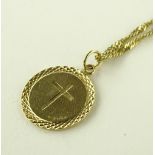 A 9ct gold St. Christopher pendant on 9ct chain, 7