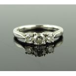 A platinum 3 stone brilliant-cut diamond ring, tot