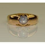 A 22ct gold star sapphire gypsy ring, pierced hear