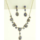 A suite of 9ct gold blue and white sapphire jewell