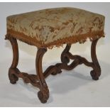 A 19th century French walnut framed dressing stool