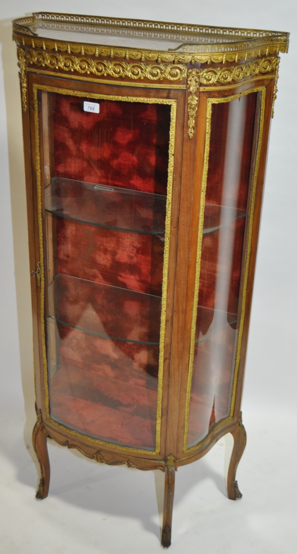 A French walnut vitrine cabinet circa 1900, shaped