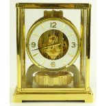 A Jaeger le Coultre Atmos clock, glazed brass case