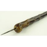 A late 19th century root wood flick stick, with co