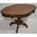 A Victorian mahogany centre table with shaped top,